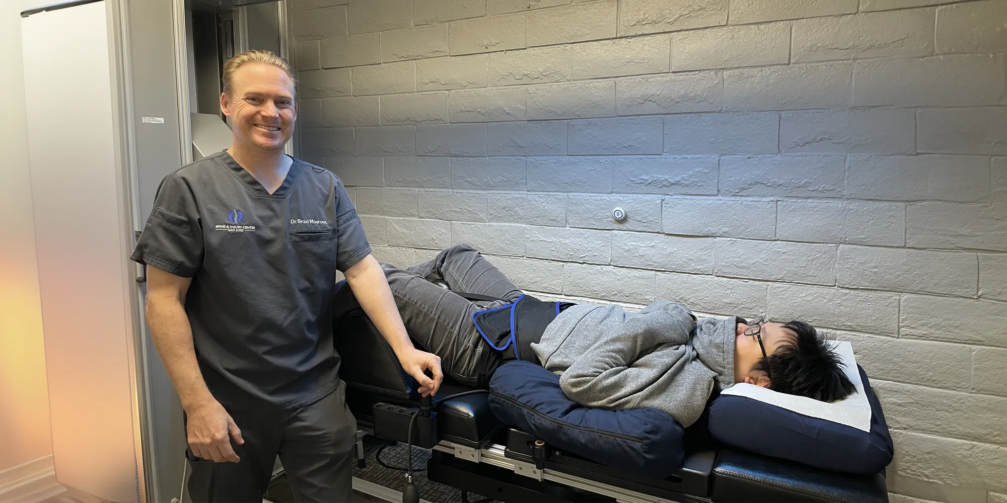 Chiropractor Campbell CA Bradley Mouroux With Decompression Patient